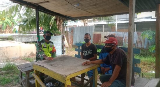 sosialisasi terkait tentang wabah Covid-19 di Desa Dompas Kecamatan Bukit Batu